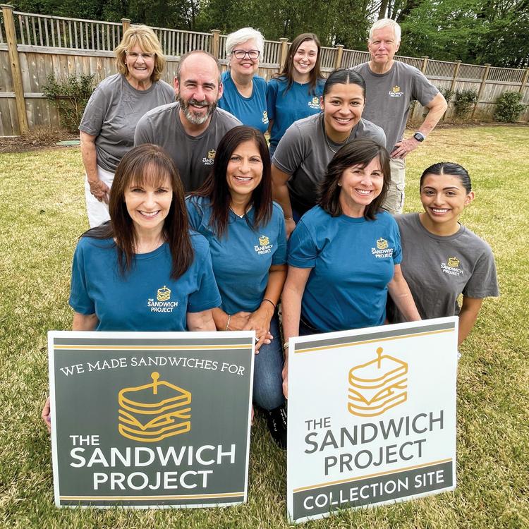 The Sandwich Project volunteers gather at an event