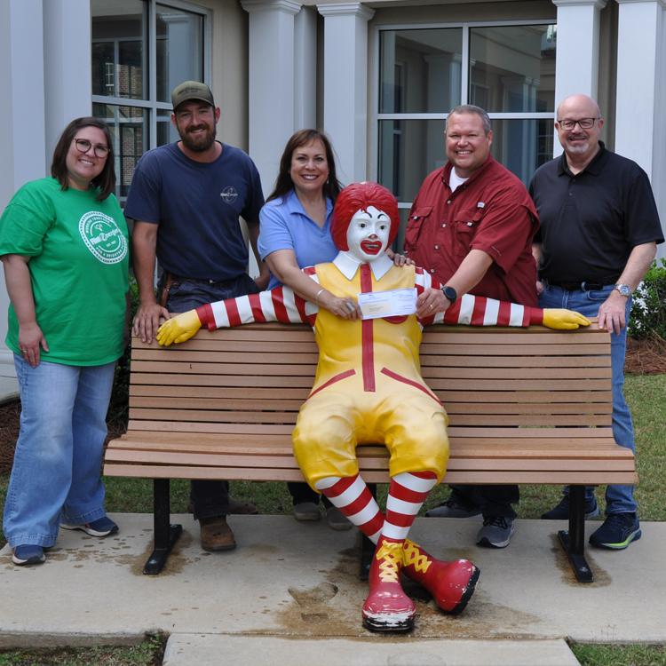 Flint Energies workers collect pop tabs to benefit the Ronald McDonald House