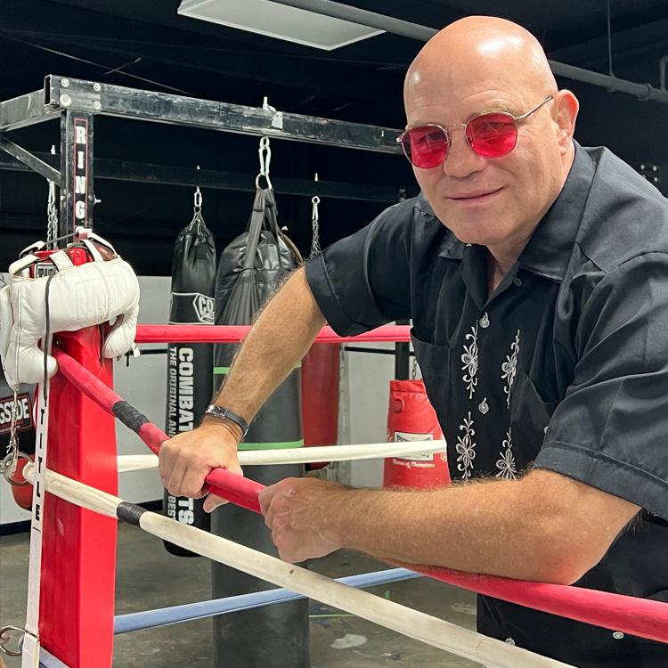 Homer Gibbins helps area residents inside, outside the boxing ring