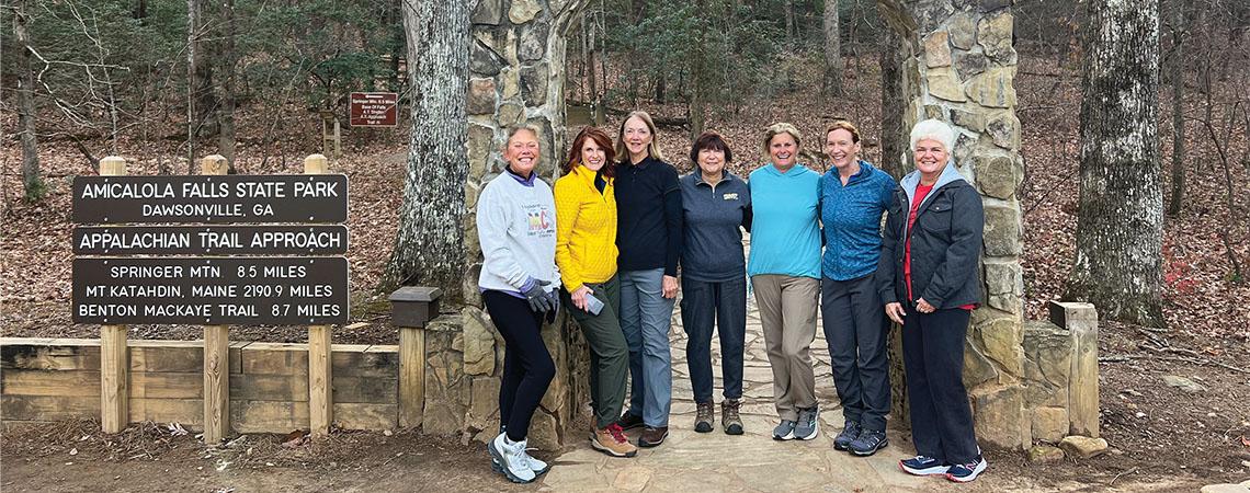 group of women pose for photo