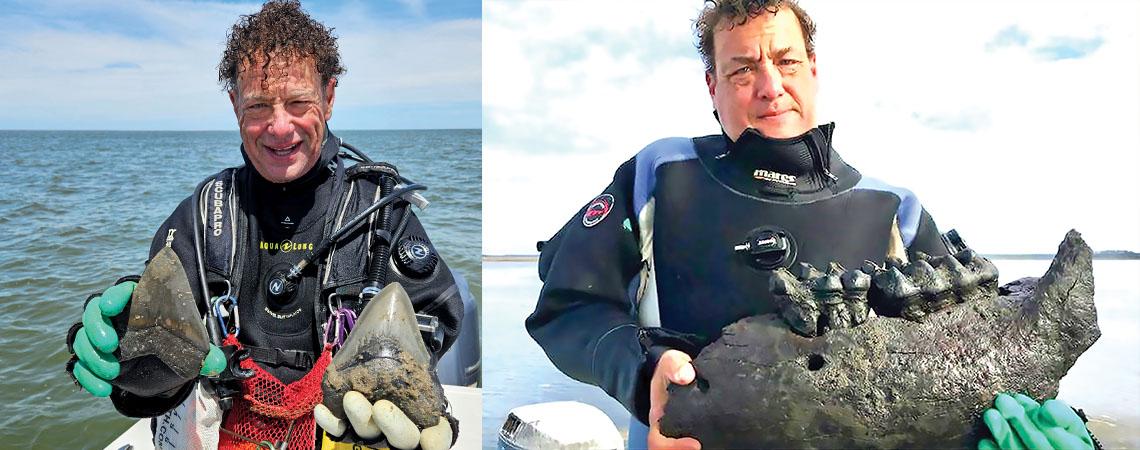 man holding shark teeth